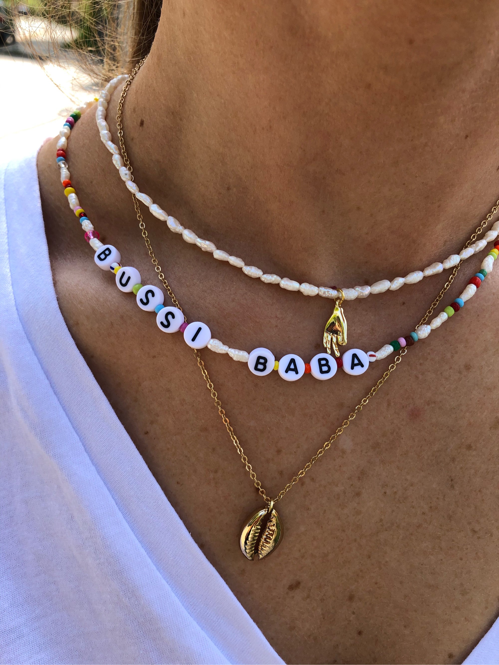 Kauri - vergoldete Kette mit Muschel-Anhänger