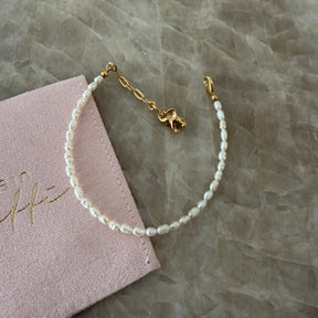 Lucky Elephant - Reines Süßwasserperlen-Armband mit Elefant-Anhänger